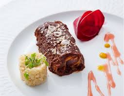 Sazon signature dishes Sopa de Amor (Corn and Poblano Soup), Enchiladas de Mole, Tres Leches Cake, Cholula Calamari